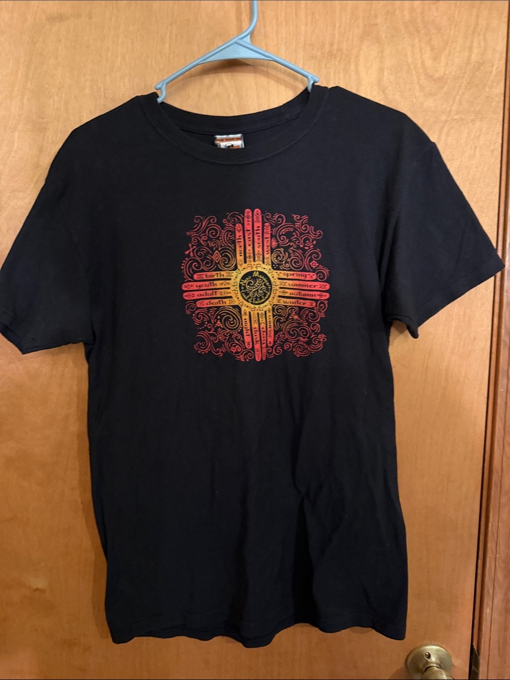 Black Short Sleeve Tee with Red and Yellow Sunburst Graphic
